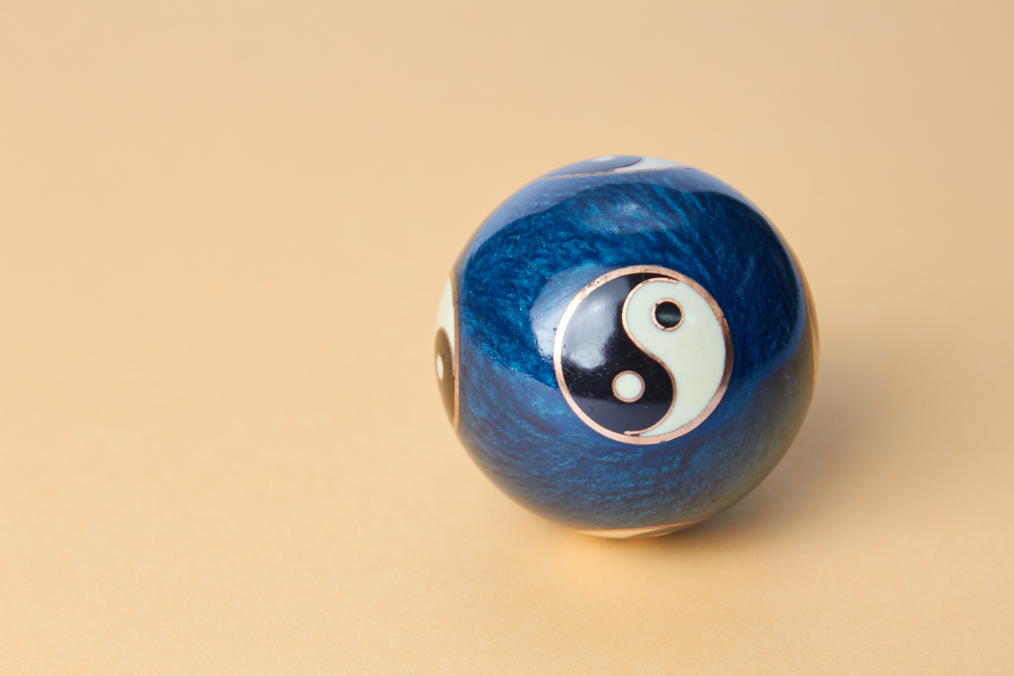 A Chinese ball with the yin-yang symbol